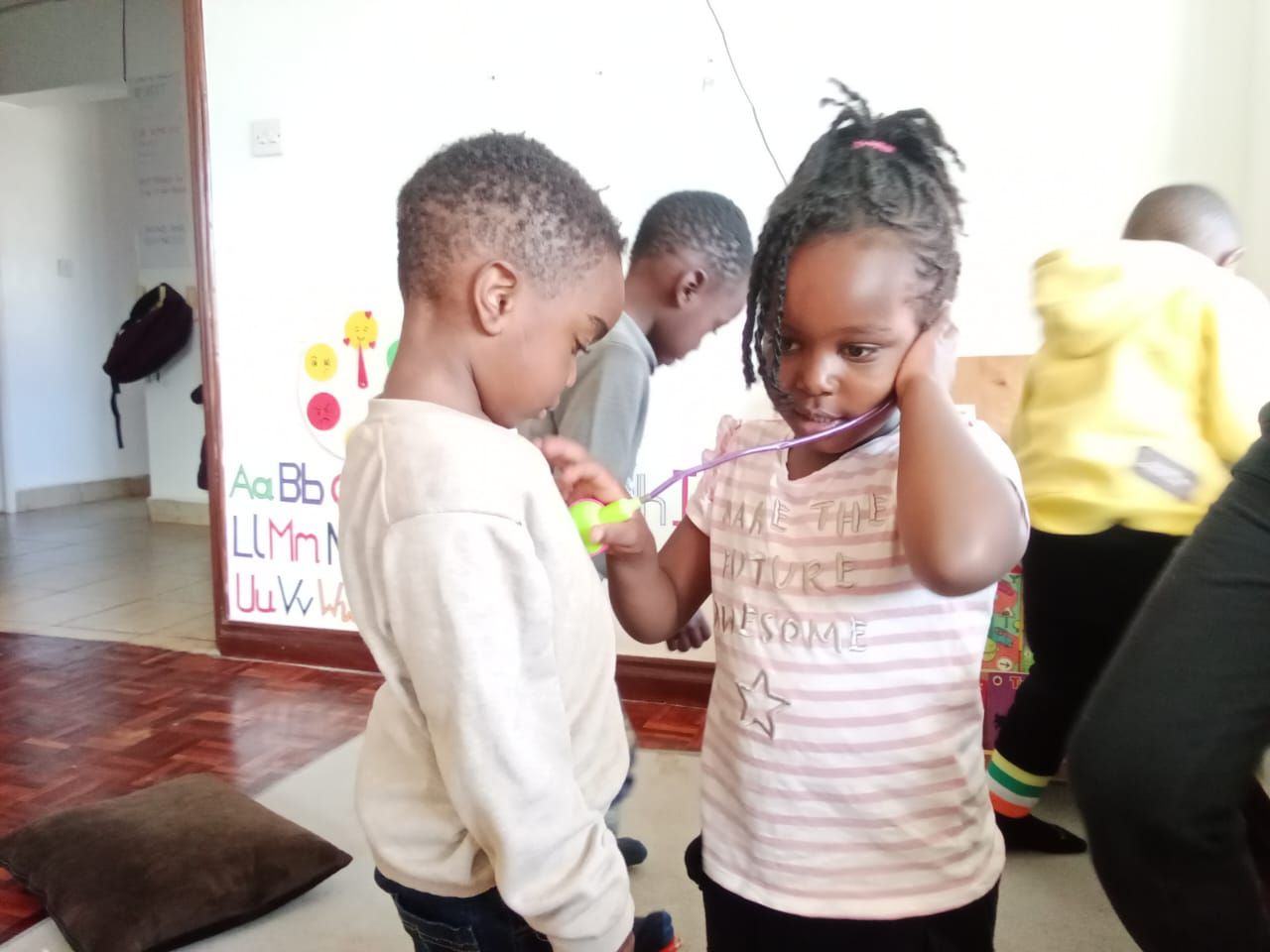 Two Golden Rays learners exploring together